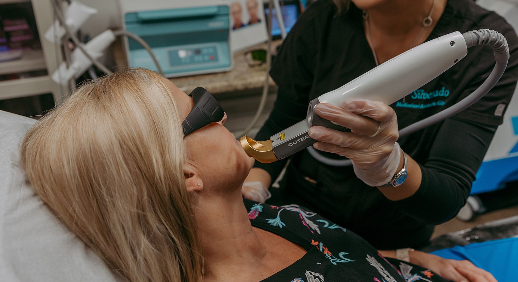 Laser treatment session in a medical aesthetic clinic.
